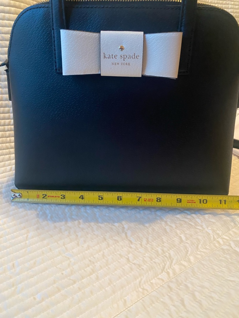 Kate Spade black satchel with white bow accent. Beautiful! - Picture 9 of 11